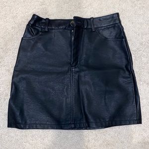 Forever 21 Faux Leather Black Skirt with front and back pockets size SMALL